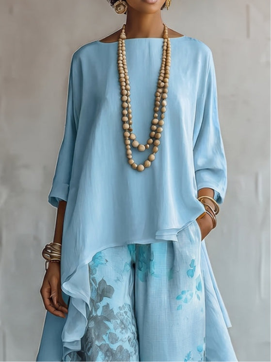 Rosenda | Conjunto de Top Asimétrico Azul y Pantalón de Flores